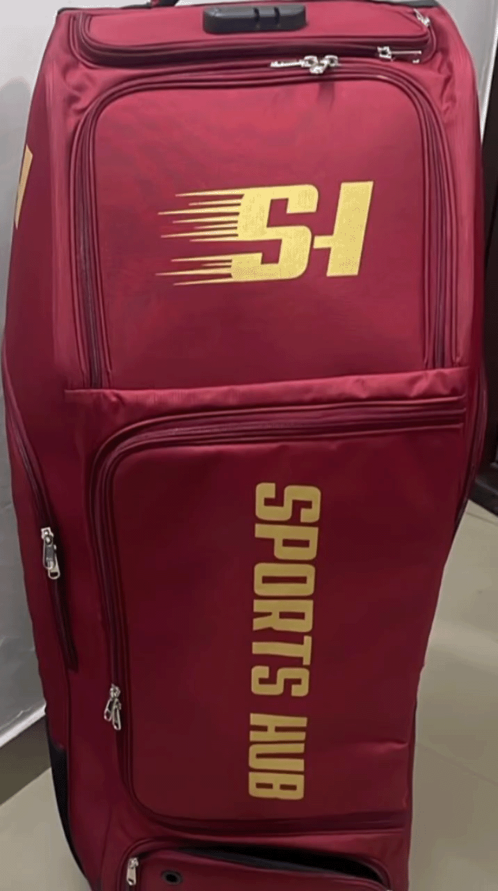 Front view of the Sports Hub Pro Edition cricket kit bag in maroon and gold featuring a secure integrated number lock and large storage compartment.