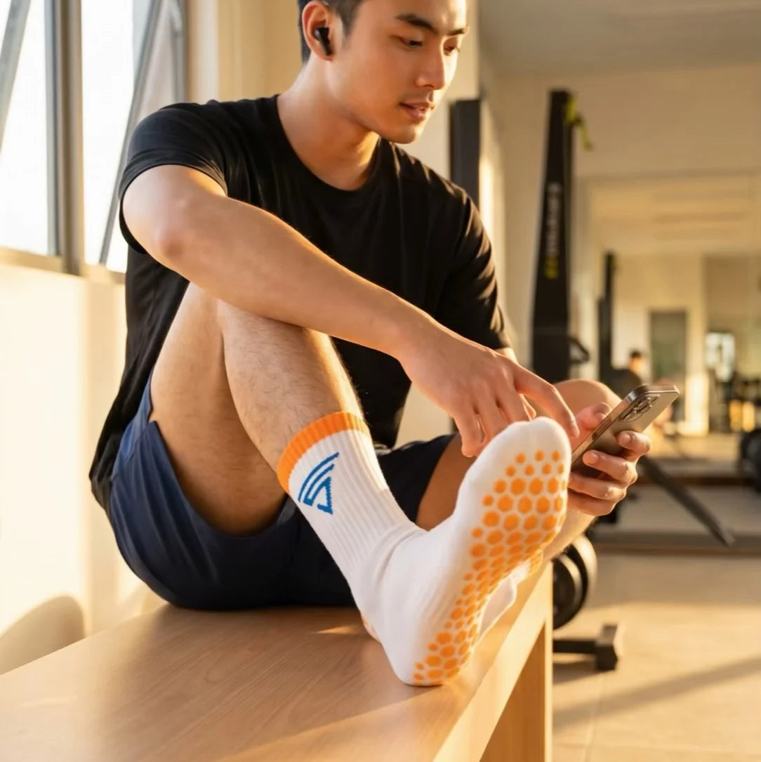 Versant GC Grip Socks with silicone grip sole technology for enhanced traction, stability, and comfort during sports and training.