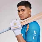 Versant OG White Cricket Batting Gloves with premium sheep leather palm, TRI-section finger construction, high-density impact protection, and breathable comfort for cricket batting.